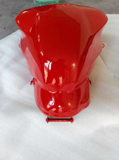 Red fuel tank for Ducati SuperSport 939, detail shot of petcock port and lower tank connection points