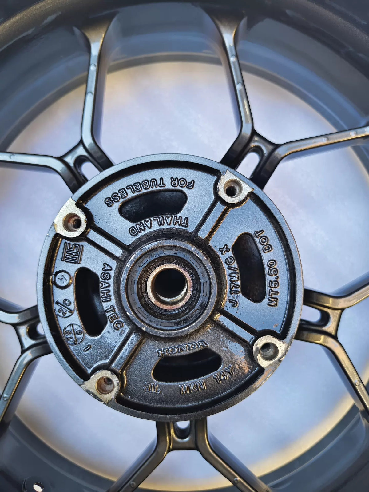 Honda CBR650R rear wheel, rear-facing view showing sprocket carrier side
