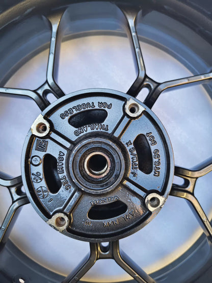 Honda CBR650R rear wheel, rear-facing view showing sprocket carrier side