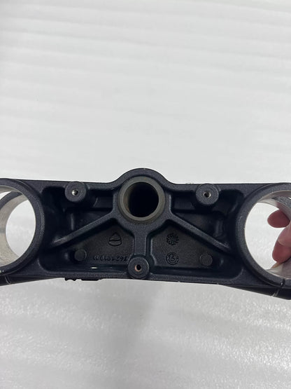 Upper fork yoke Ducati Multistrada 1200, close-up of central stem hole and bolt mounting points