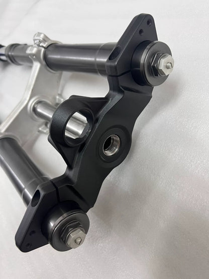 Upper triple clamp top view showing stem and handlebar mounts, Ninja 1000SX fork assembly