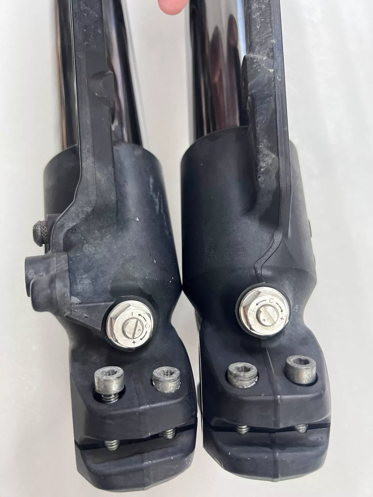 Ducati Diavel 1200 front fork pair standing upright, showing overall condition and both legs together