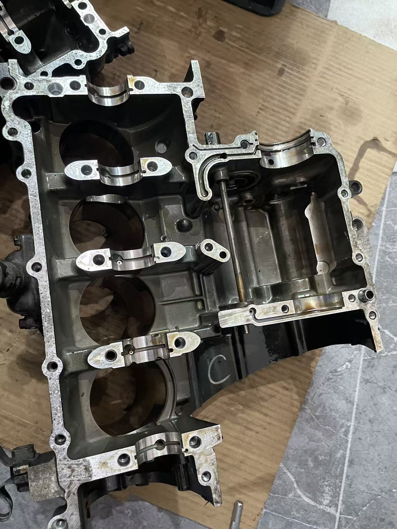 Overhead view of YZF-R6 upper crankcase with four cylinder bores and main bearing saddles