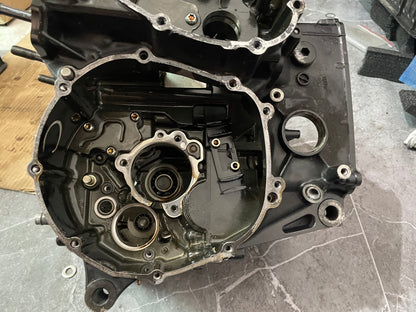 Inner clutch-side YZF-R6 crankcase half showing bearing bores, seals and gasket surface