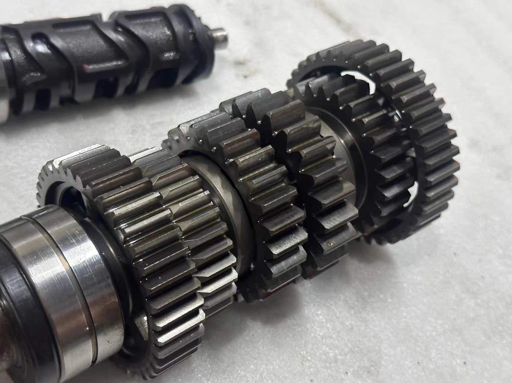 Kawasaki Z1000 Transmission Shift Drum Used OEM – close-up of drum indexing teeth