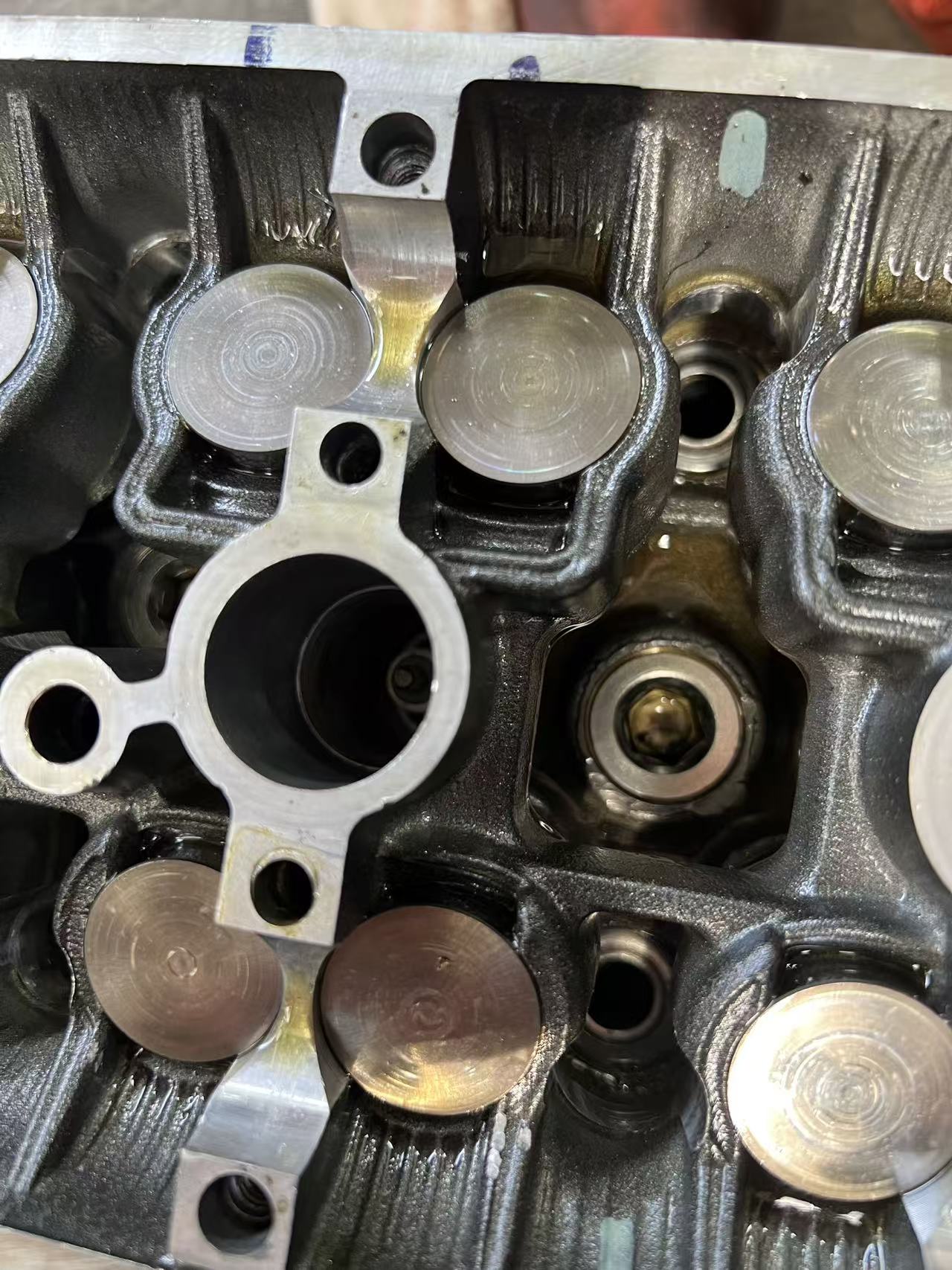Yamaha YZF-R6 cylinder head used ~12K miles – surface wear and marks detail