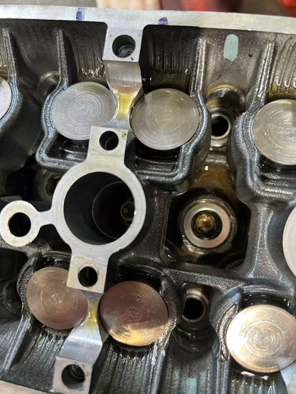 Yamaha YZF-R6 cylinder head used ~12K miles – surface wear and marks detail