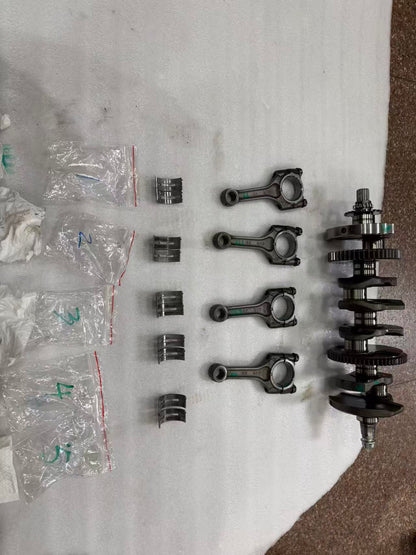 Suzuki GSXR 1000 crankshaft with connecting rods front view showing full assembly condition