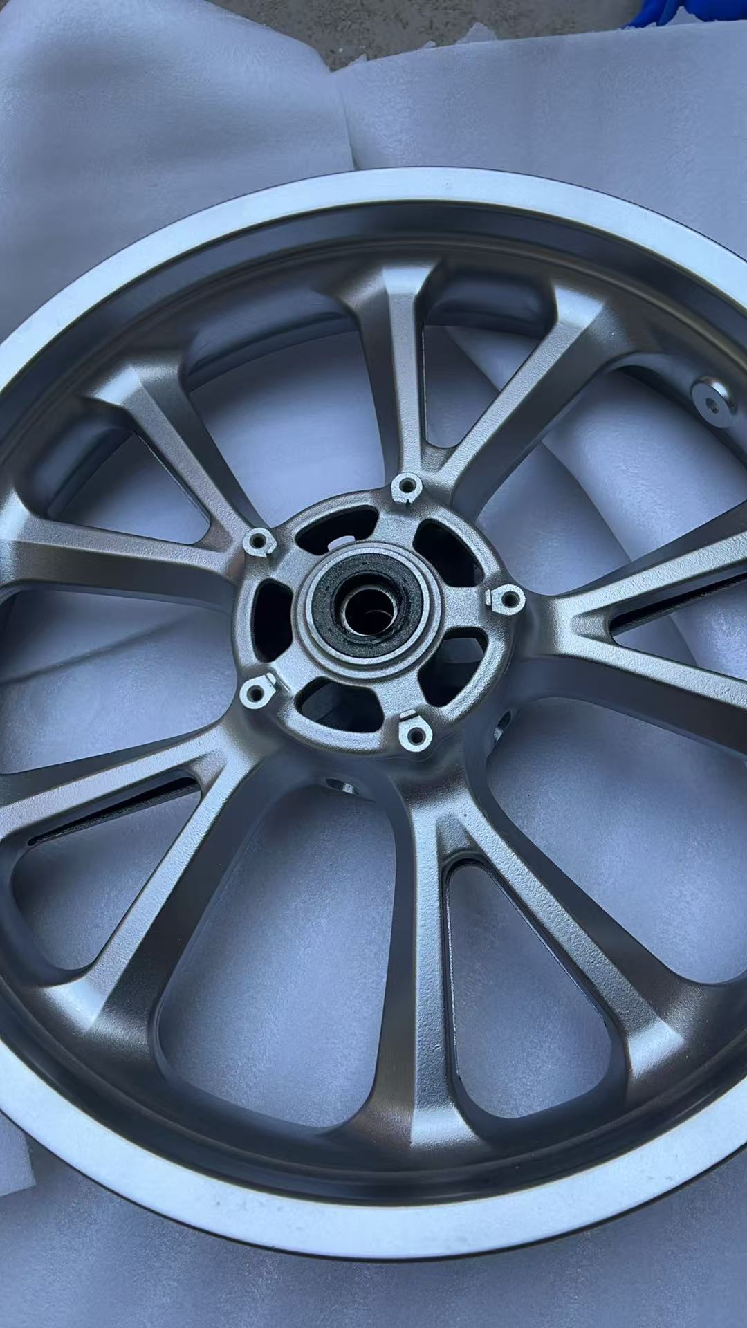GL1800 front rim rear-angle view showing hub flange spoke holes and overall wheel condition