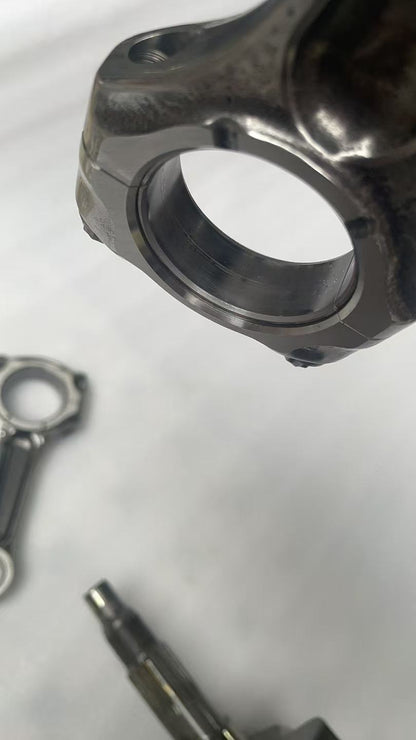 Ducati MTS1200 crankshaft rotor end close-up, showing flywheel magnets and outer rotor face in used condition
