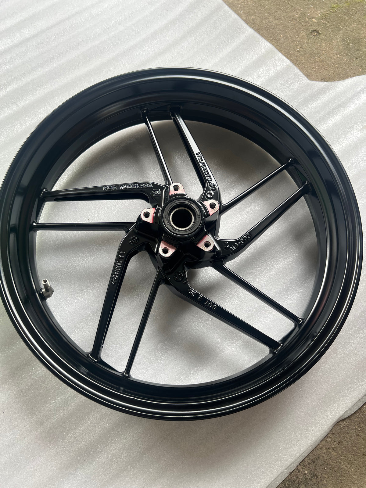 Ducati Monster 821 front wheel, rear-facing view showing brake rotor mounting and hub