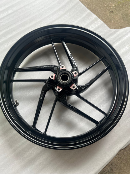 Ducati Monster 821 front wheel, rear-facing view showing brake rotor mounting and hub