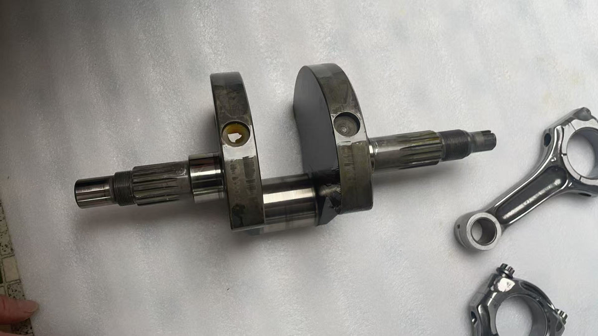 Top-down view of Ducati Multistrada 1200 crankshaft assembly showing dual connecting rods and crank pins