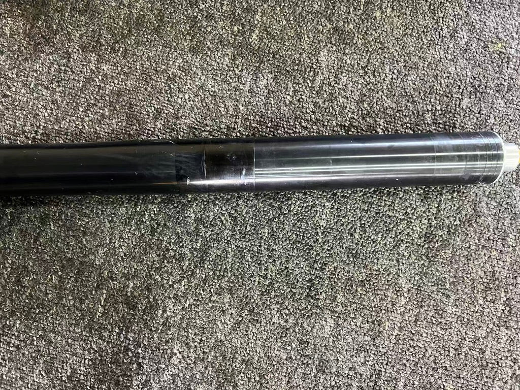 Yamaha YZF-R6 08-16 fork chrome stanchion close-up beside black axle bracket, minor surface scratches