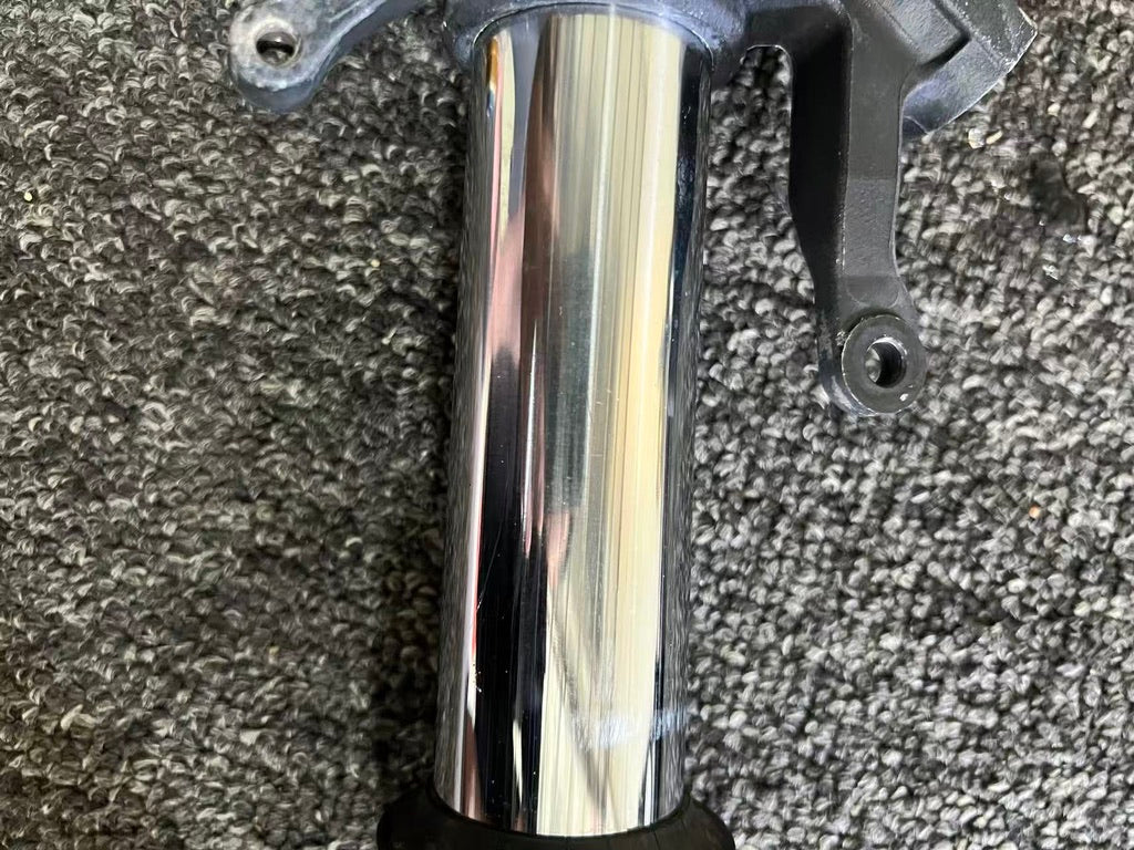 Yamaha YZF-R6 front fork lower tube detail, glossy black with light marks, fits 2008-2016