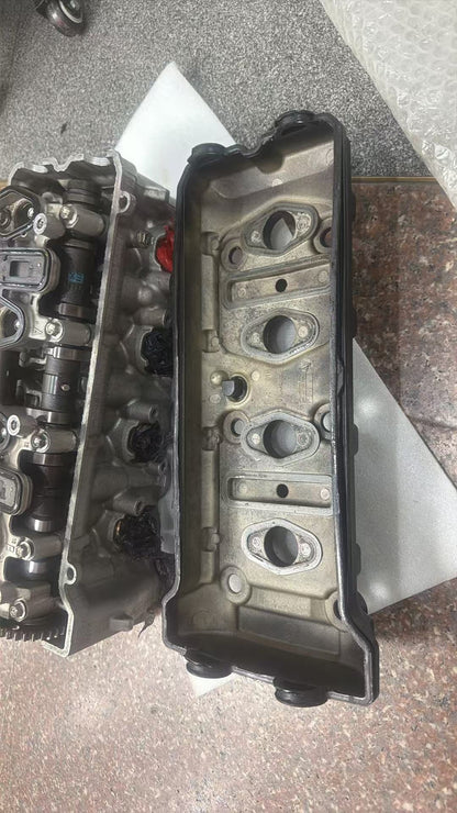 GSX-R600 K6 K7 cylinder head DOHC camshafts and timing gears angled close-up view