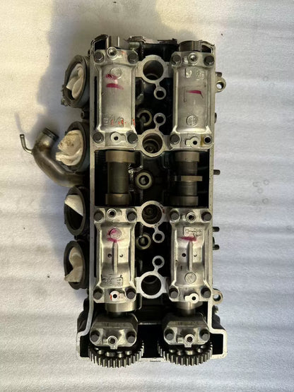 Top valvetrain view of Yamaha YZF-R1 cylinder head, dual camshafts, cam caps and sprockets, used