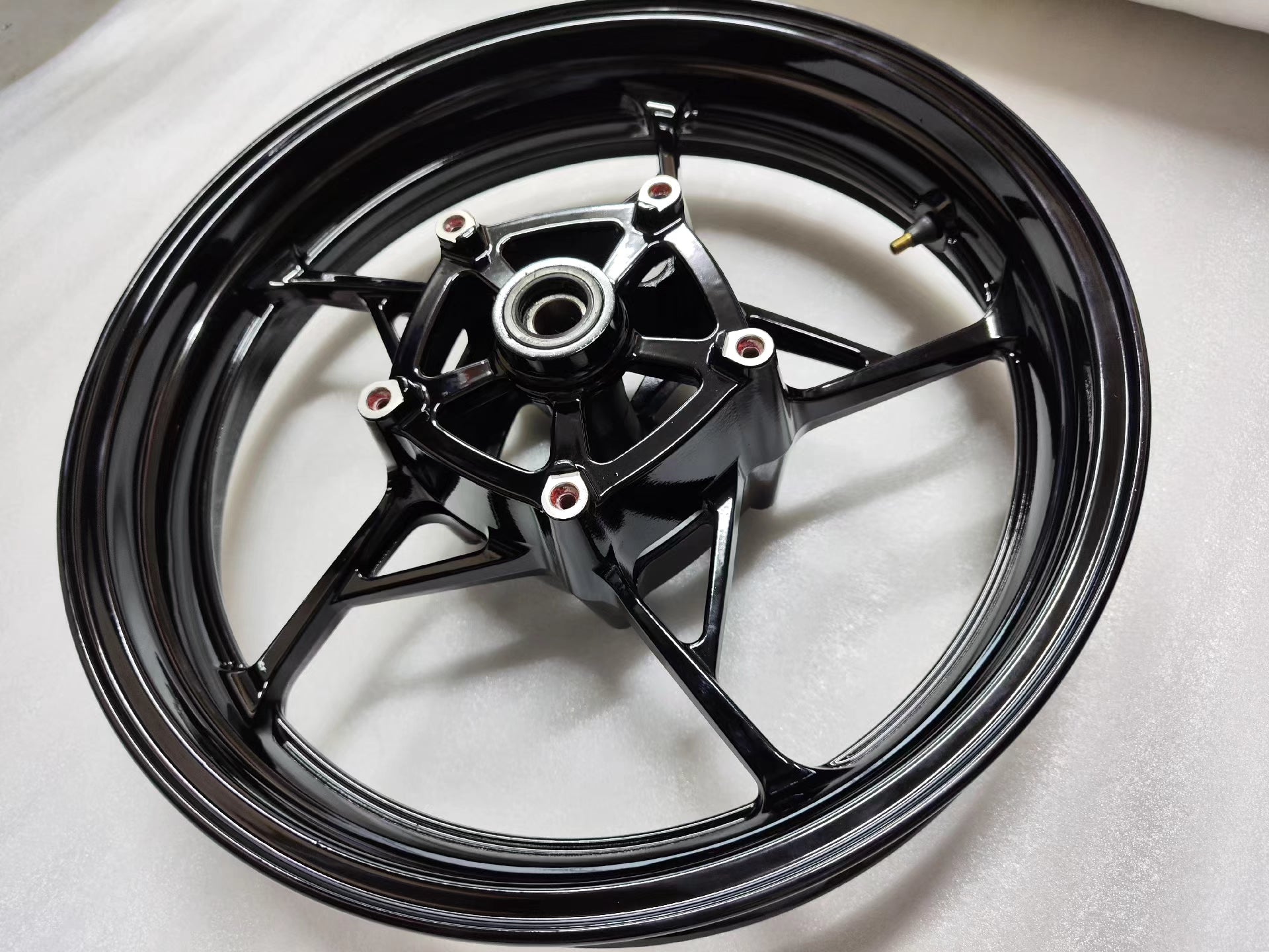 Kawasaki Ninja 650 front wheel repaint gloss black straight true condition detail