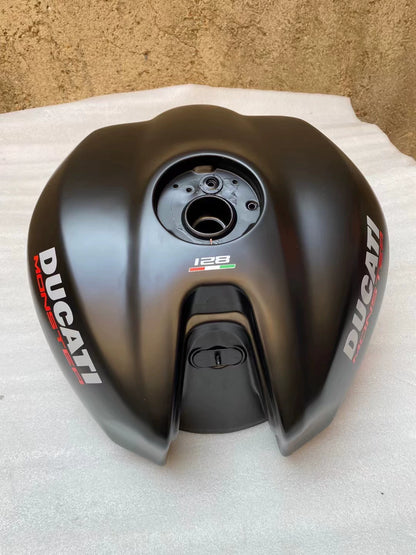 Ducati Monster 821 OEM fuel tank repainted red, side profile view showing clean paint and shape