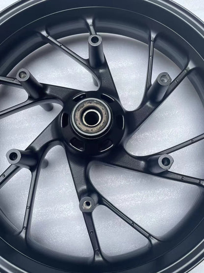 Honda CB650F 17x3.5 front wheel ten-spoke rim matte black detail
