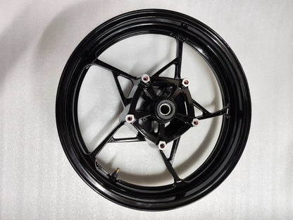 Kawasaki Ninja 650 front wheel hub center bearing and cast part number close-up
