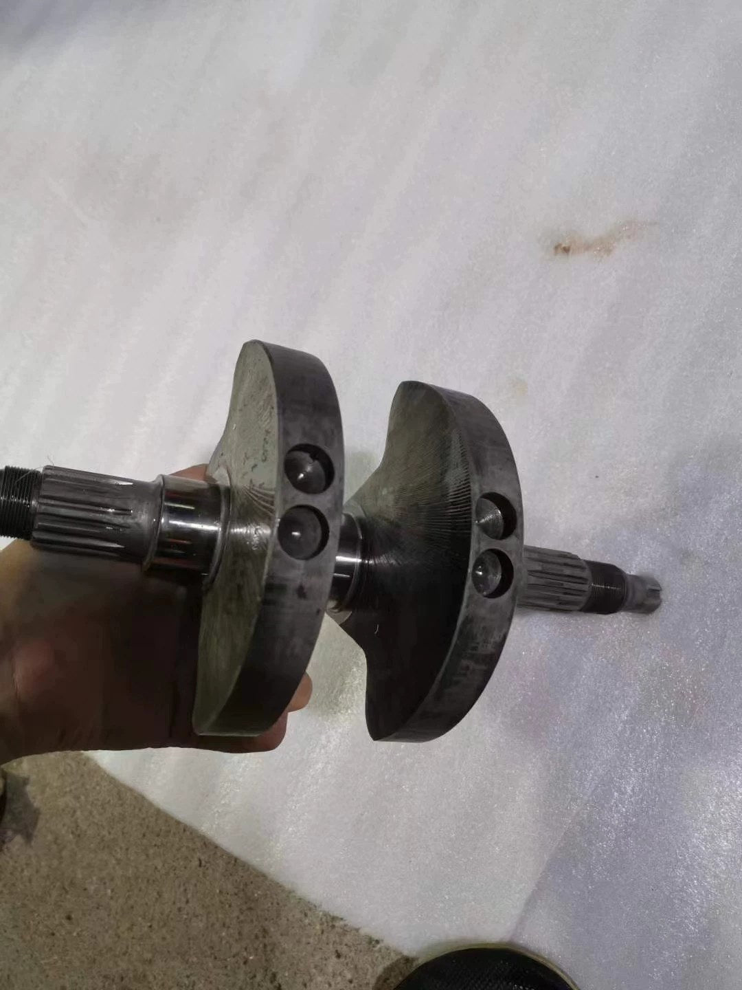 Ducati 848 crankshaft front angle detail showing main journals and crank pin, inspected used part